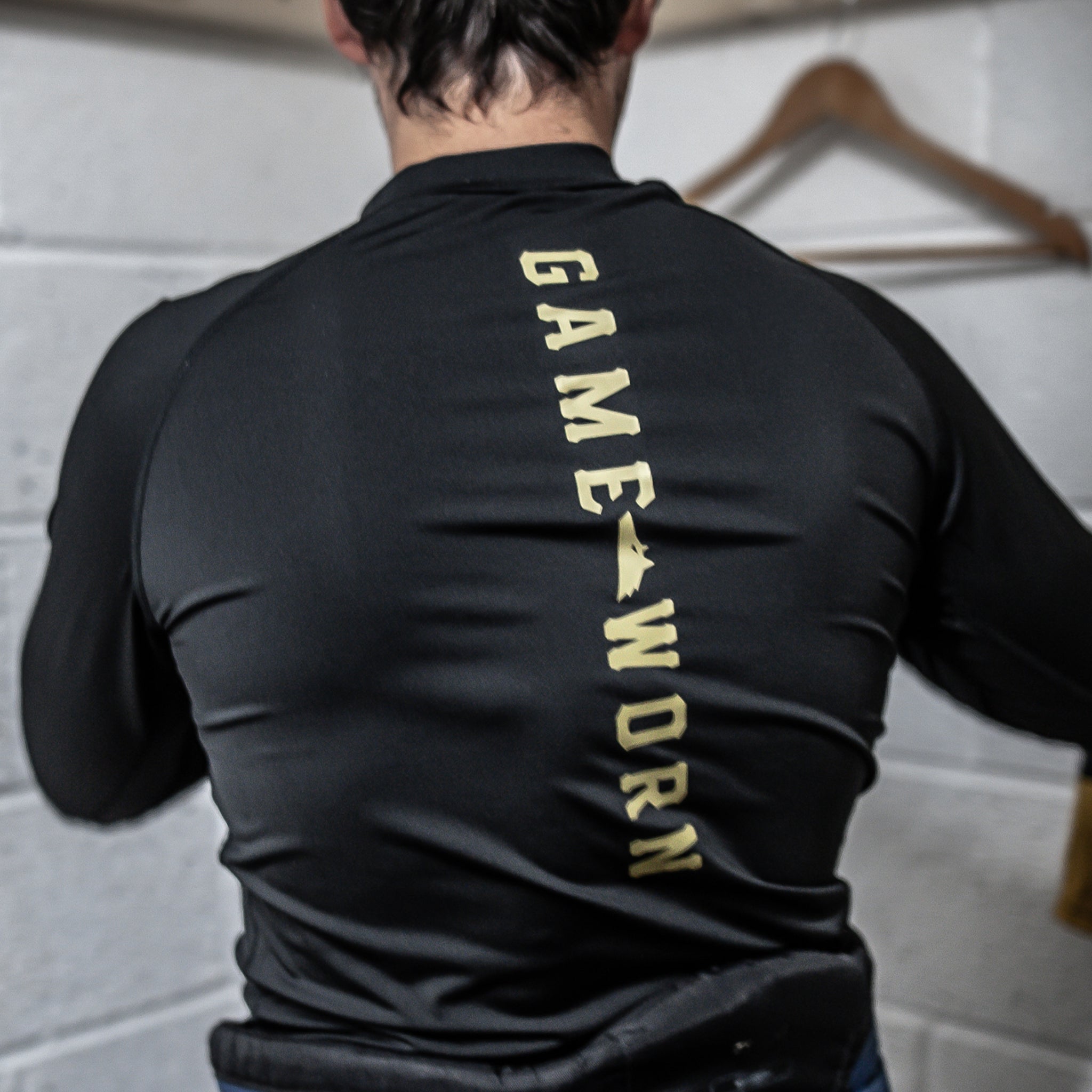 GAME-WORN® Base Layer Top Stealth Black and Gold