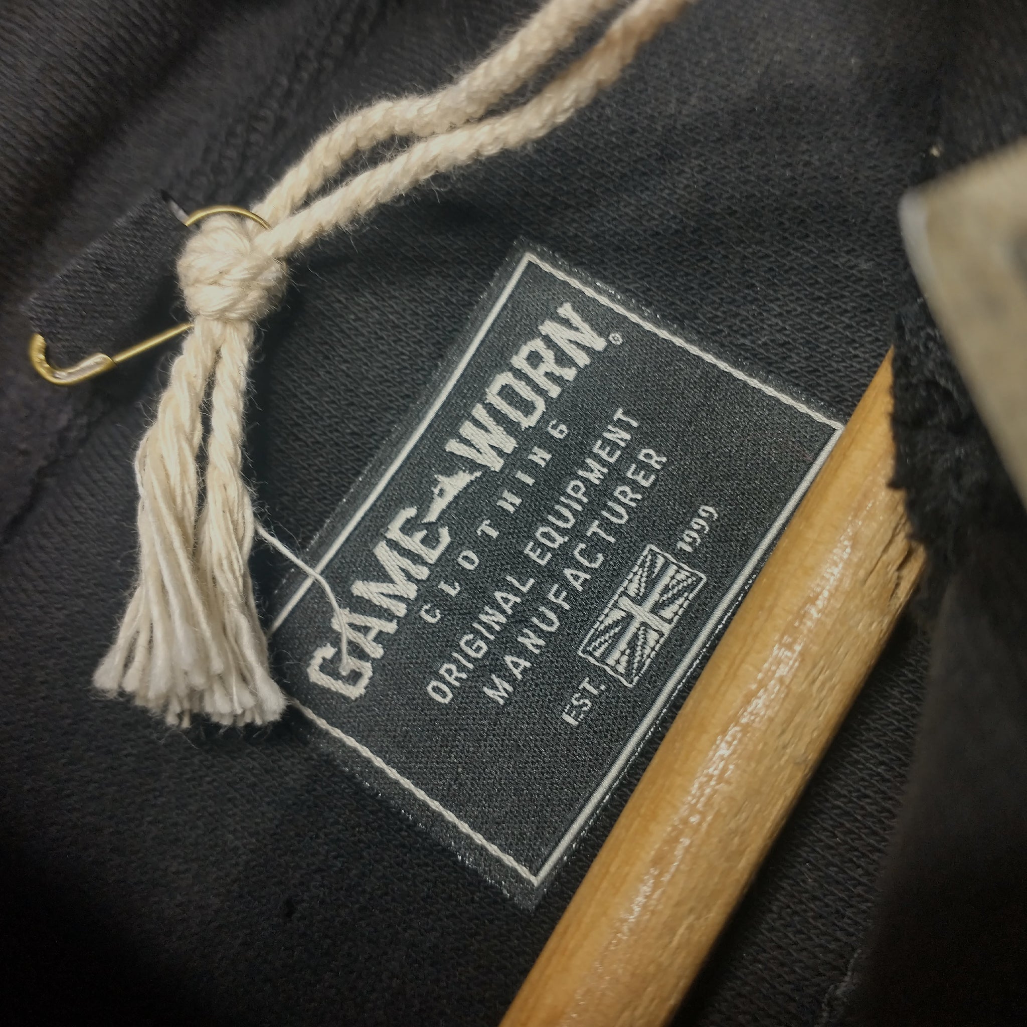 GAME-WORN® Hockey Age Washed Sideline Hoodie - Charred Black and Gold